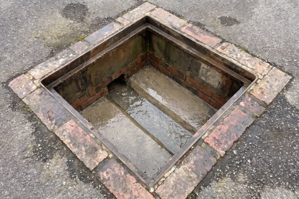 After: the same drain clear and flowing freely